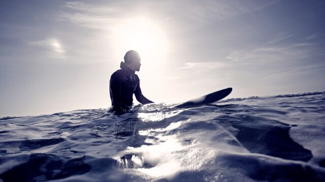 Surfer in ocean - Small